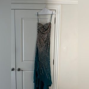 Teal colour prom dress. Size small. With Sequence.